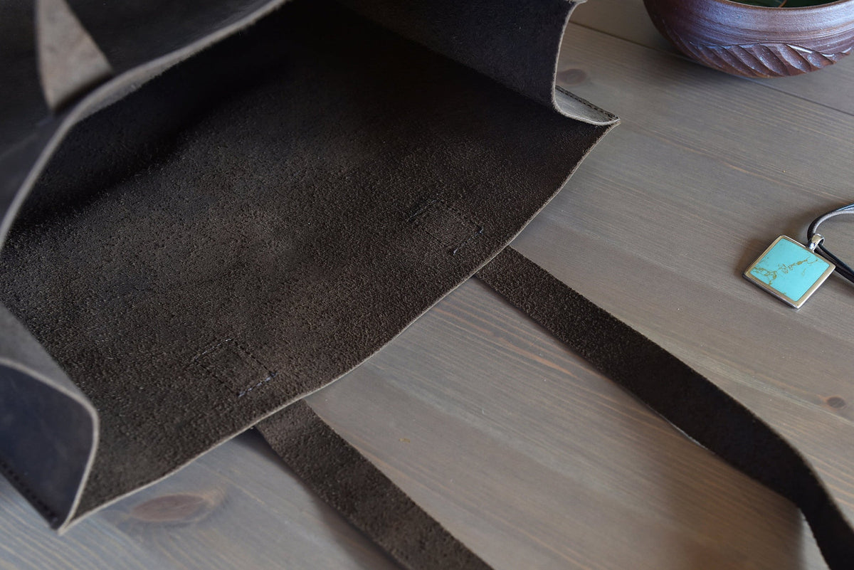 Inside the unlined tote, showing the soft brushed underside of the hide