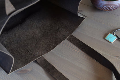 Inside the unlined tote, showing the soft brushed underside of the hide