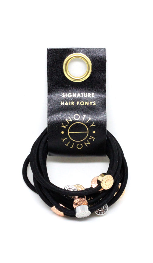 Black hair ties set of 10 on a black leather tab with a brass grommet, front view