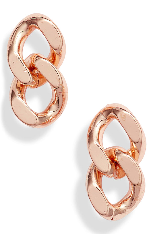 Rose gold plated chain link studs, the pair set at an angle on white