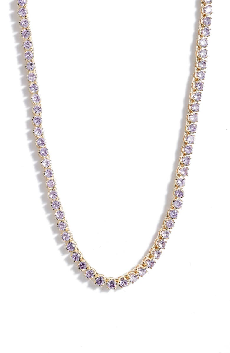 Lavender tennis necklace up close, small round pale purple stones set side by side in gold tone