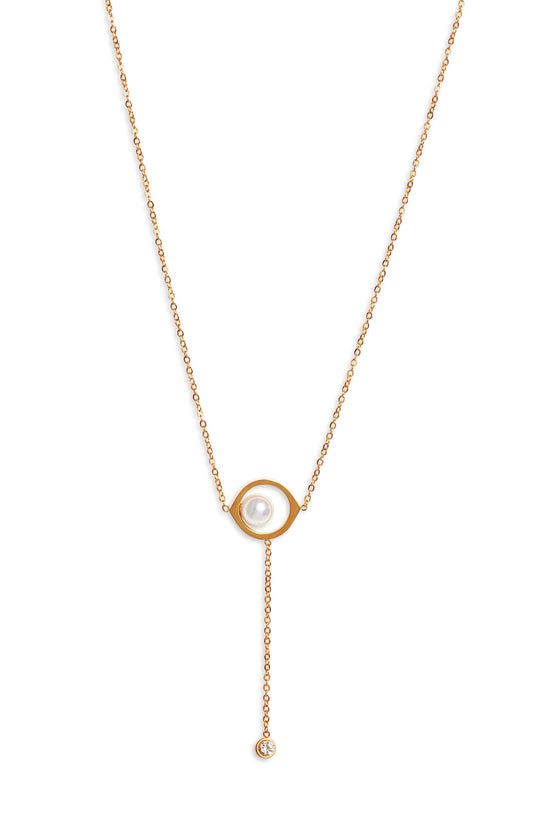 Y necklace with a white pearl inside an open almond shaped gold tone frame and a chain drop ending in a crystal