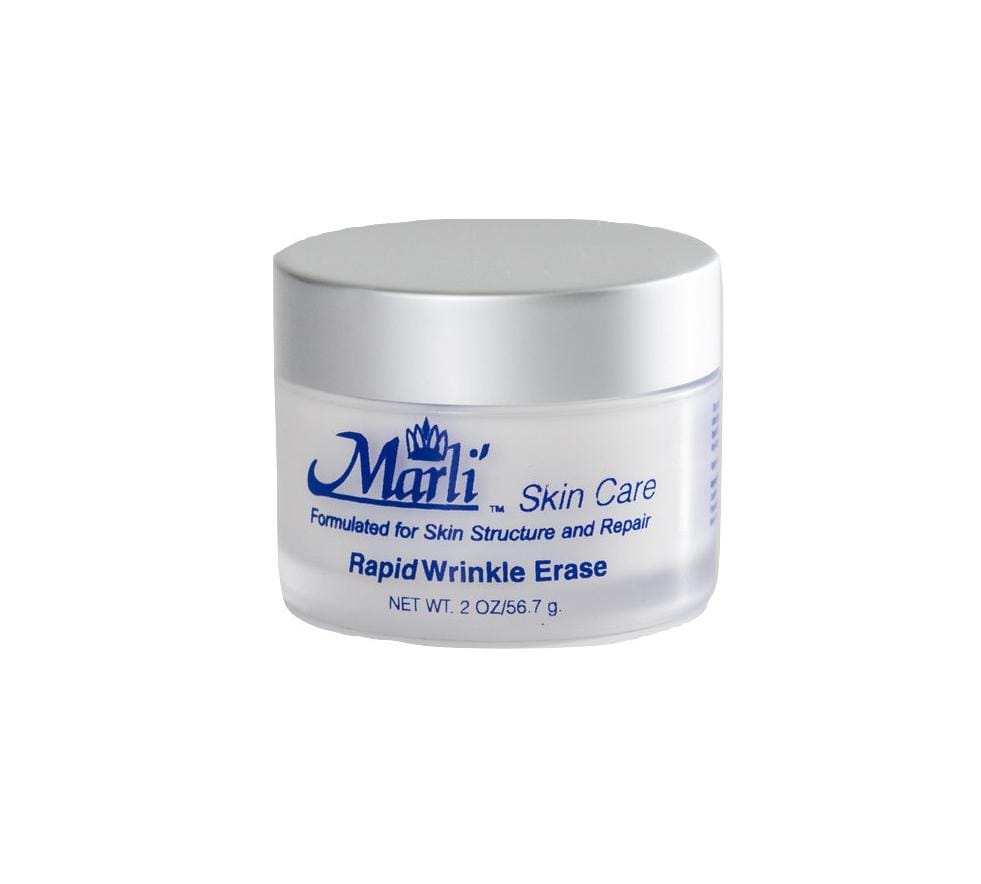 Small frosted jar of Marli Skin Care face cream with a silver lid on white
