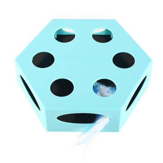 Light blue hexagonal automatic cat toy with round paw holes and a white feather tip poking out of a side opening