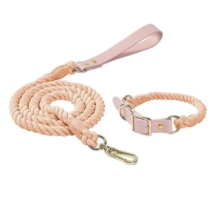 Coral cotton rope leash and matching collar with a blush leather tab and brass clip.