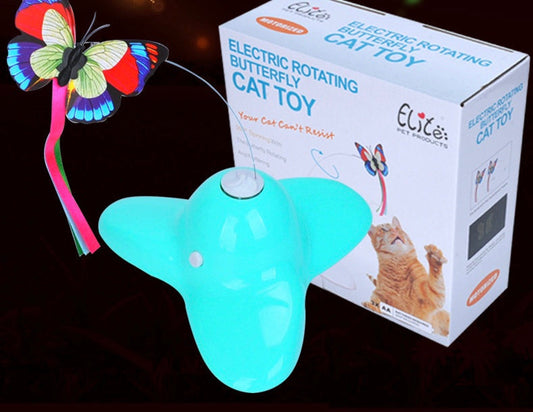 Green butterfly cat toy with a butterfly on a wire above a four-lobed base, next to its retail box on a dark background