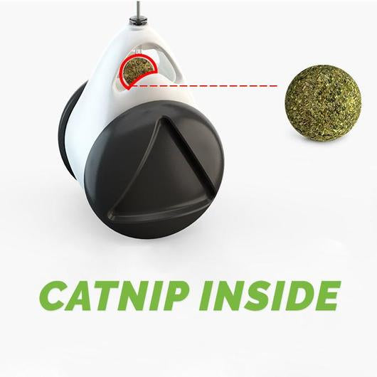 Close view of the weighted roller with a catnip ball held in a window below the spring wire, labeled catnip inside