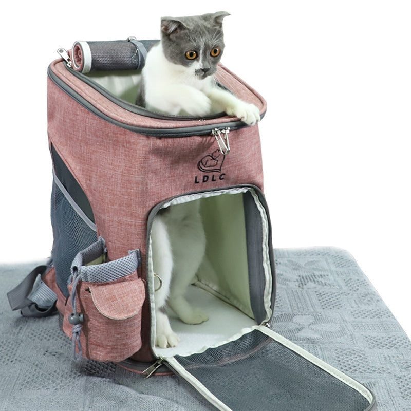 Pink soft sided pet backpack with a cat inside and the front flap open.