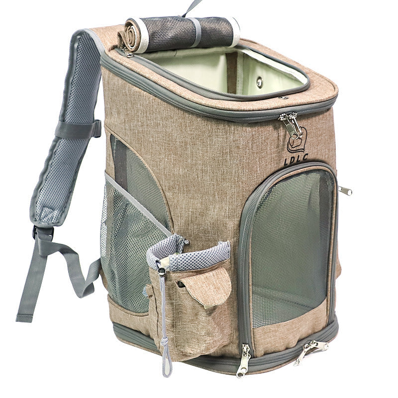 Beige soft sided pet backpack carrier with a rolled top handle.