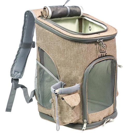 Beige soft sided pet backpack carrier with a rolled top handle.