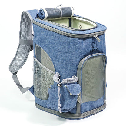 Blue soft sided pet backpack carrier with mesh side panels.