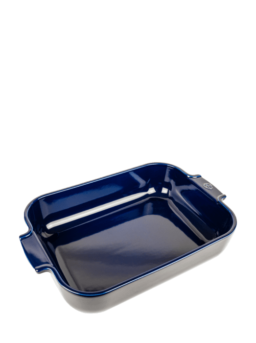 Rectangular ceramic baking dish 14 inches long, glazed blue outside with handles at each end.