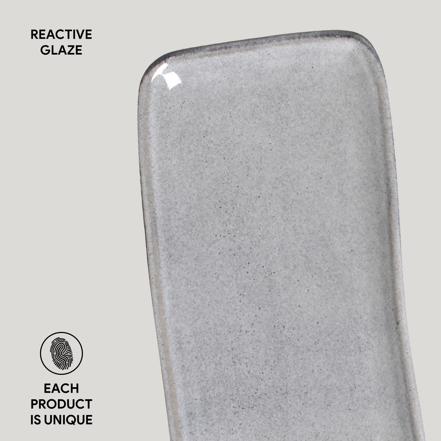 Close view of one corner, labelled by the maker as a reactive glaze finish.