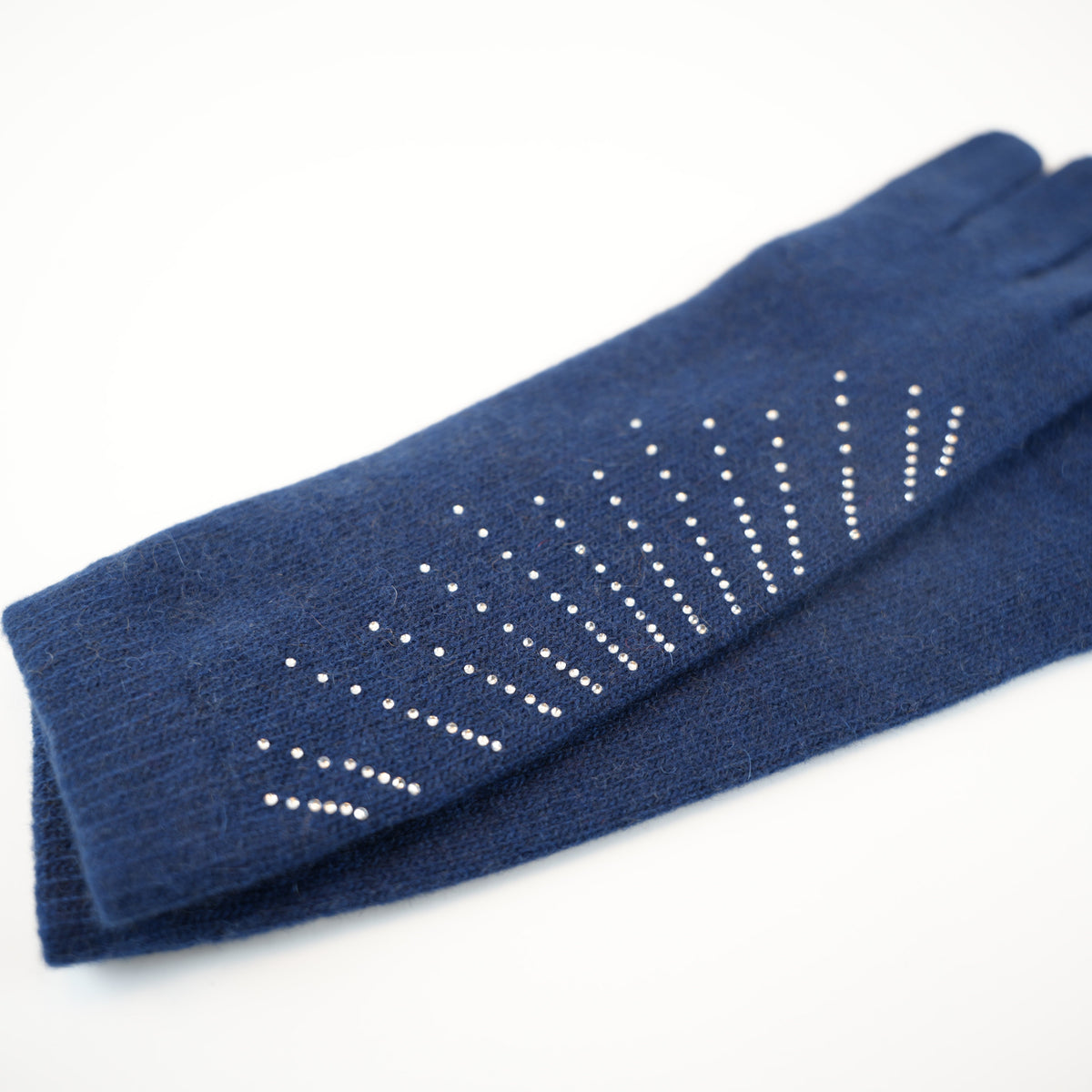Close up of the rhinestone rays on a navy long cashmere glove