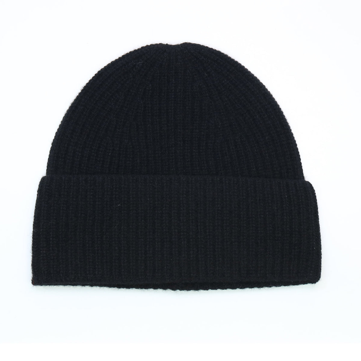 Black ribbed cashmere hat laid flat, cuff turned back