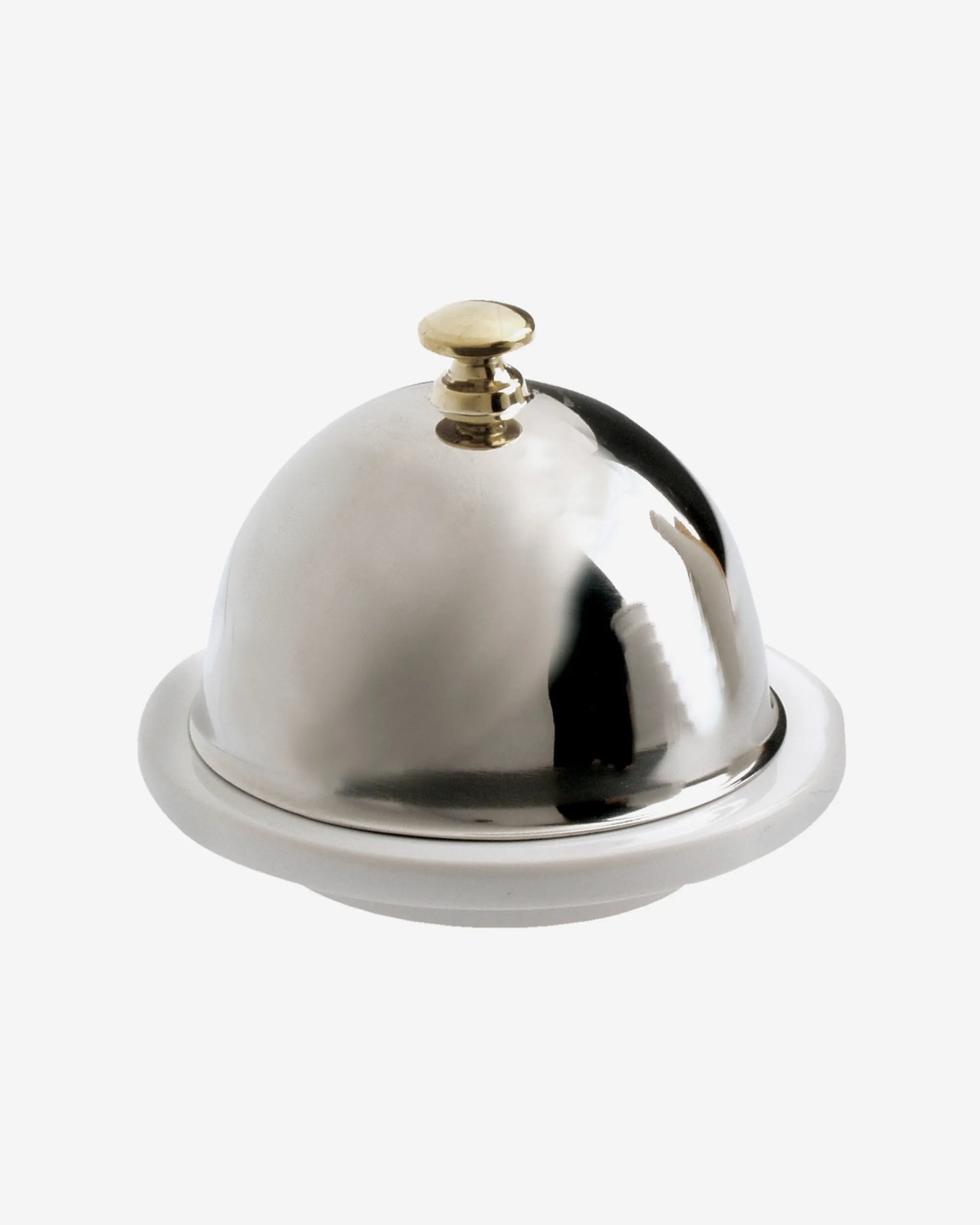 Round white porcelain butter dish under a polished stainless steel dome with a small knob.