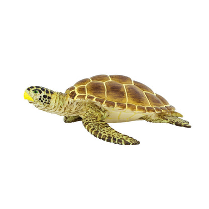 Loggerhead sea turtle figurine in a swimming pose on white, front flippers extended forward
