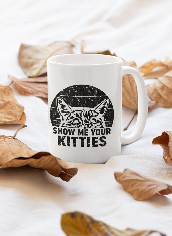 Ceramic coffee mug with a cat-themed printed slogan, fall leaves around it, 11oz size.