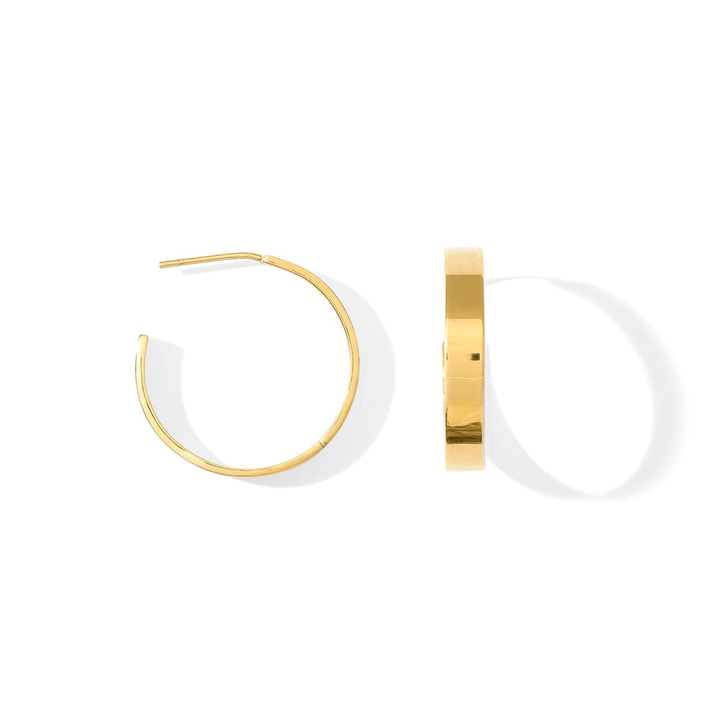 Chunky gold plated hoop earrings with a wide flat band, shown from the front and from the side on white