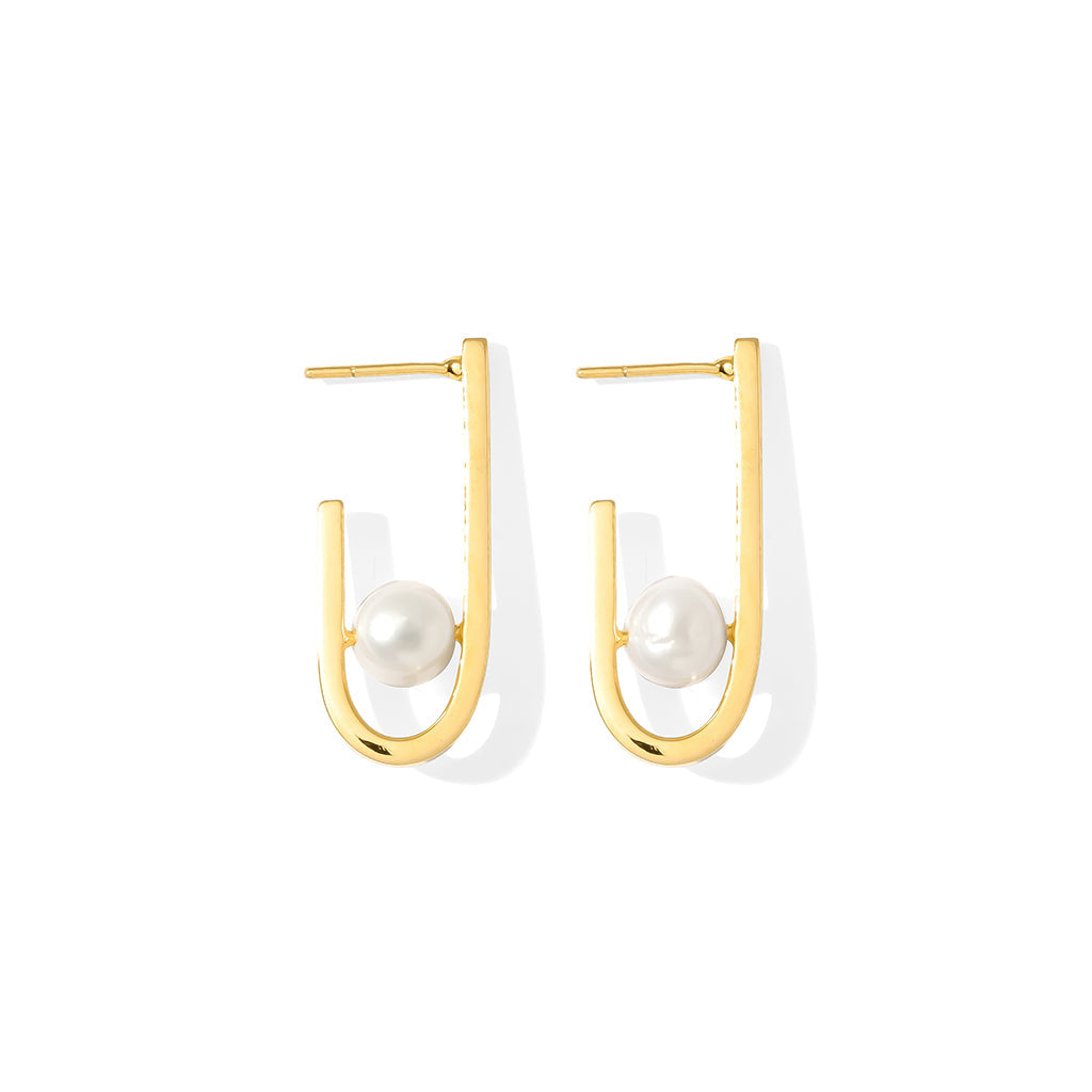 Gold plated J hoop earrings with a white freshwater pearl set in the curve, front view on white