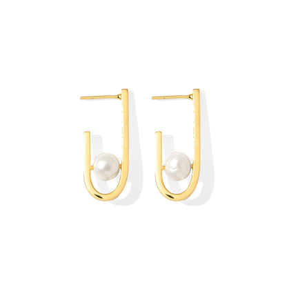 Gold plated J hoop earrings with a white freshwater pearl set in the curve, front view on white