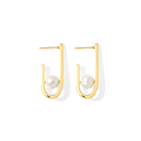 Gold plated J hoop earrings with a white freshwater pearl set in the curve, front view on white