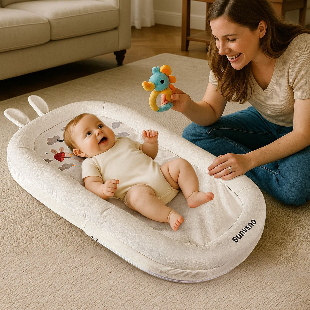 Brown infant lounger with a bear motif on the base, shown on its own.