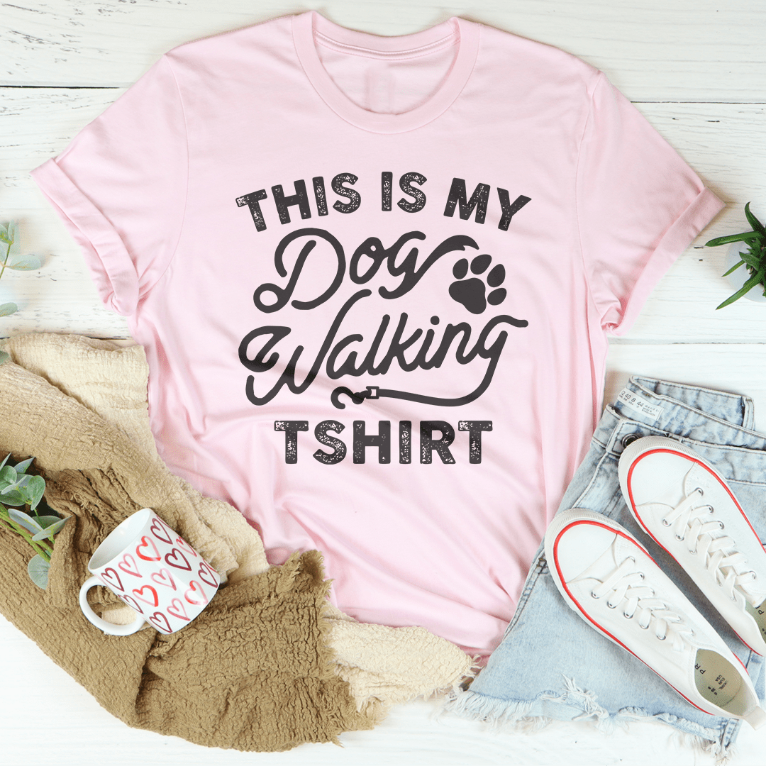 Pink unisex cotton dog walking T-shirt, printed slogan across the chest.