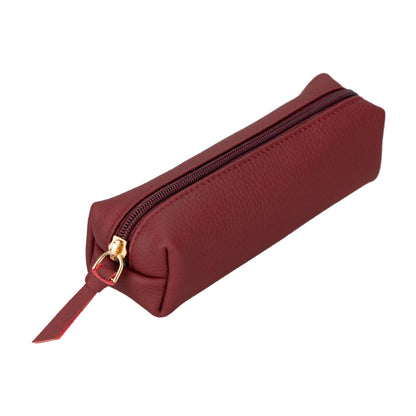 Maroon leather pencil case closed, a zip running along the top with a leather pull