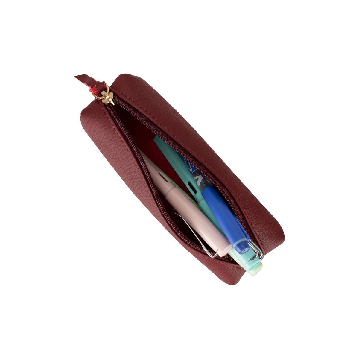 Maroon leather pencil case unzipped, pens and a highlighter lying inside