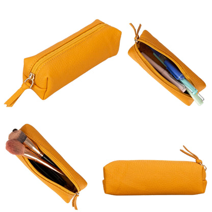 Leather pencil case in Yellow, a warm mustard, shown closed and holding pens and brushes