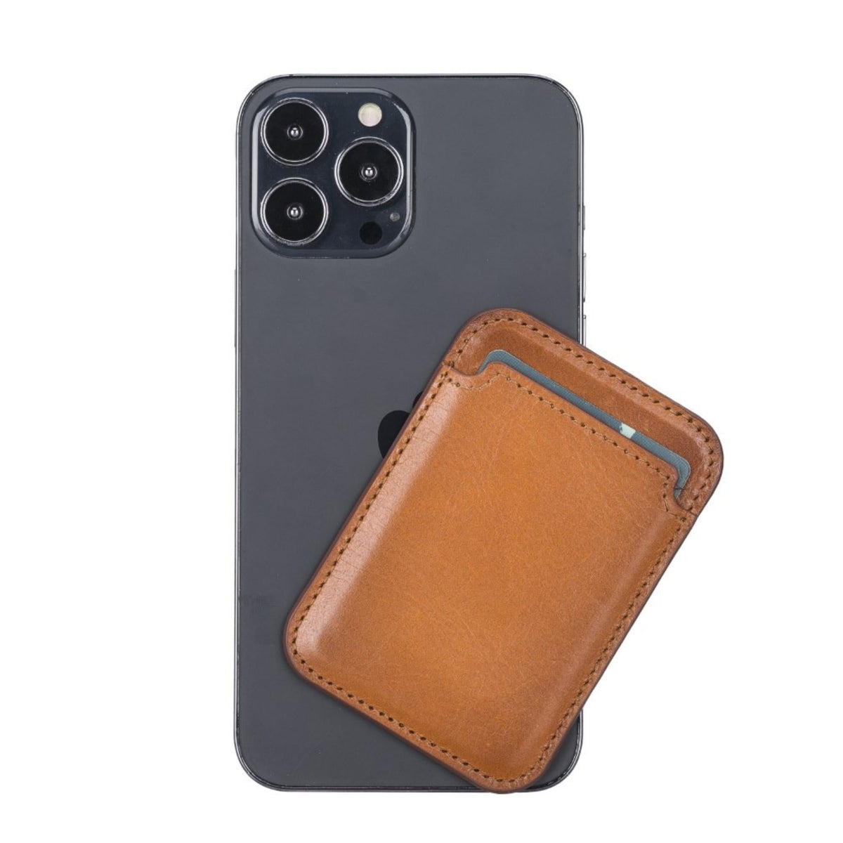 Tan magnetic card holder being lifted off the back of an iPhone at an angle