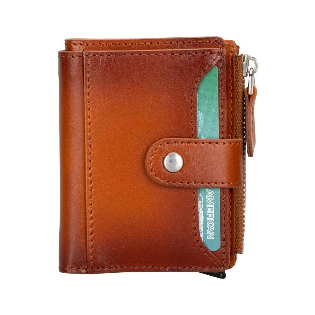 Front of the tan pop up wallet closed, the snap tab across the face and the zip down one side