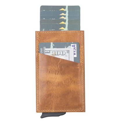 Pop up card holder in Light Brown, a mottled waxy leather, five cards fanned up from the top
