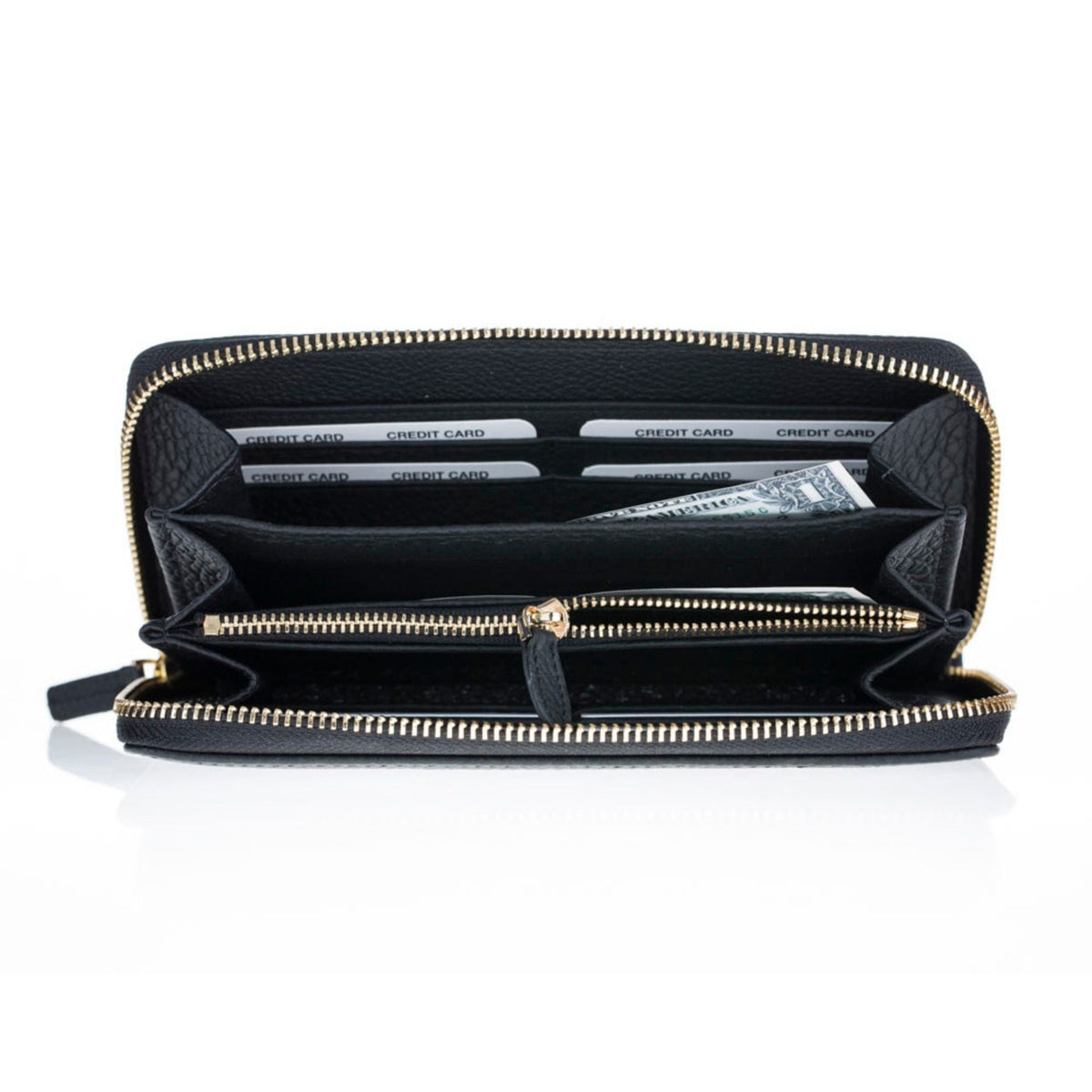 Inside the black zip around wallet laid open, rows of card slots over the zip coin compartment