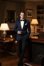Vermont Midnight Blue Tuxedo Jacket with Peak Lapels, made by Tux-USA, displayed on a hanger with a smooth fabric finish.