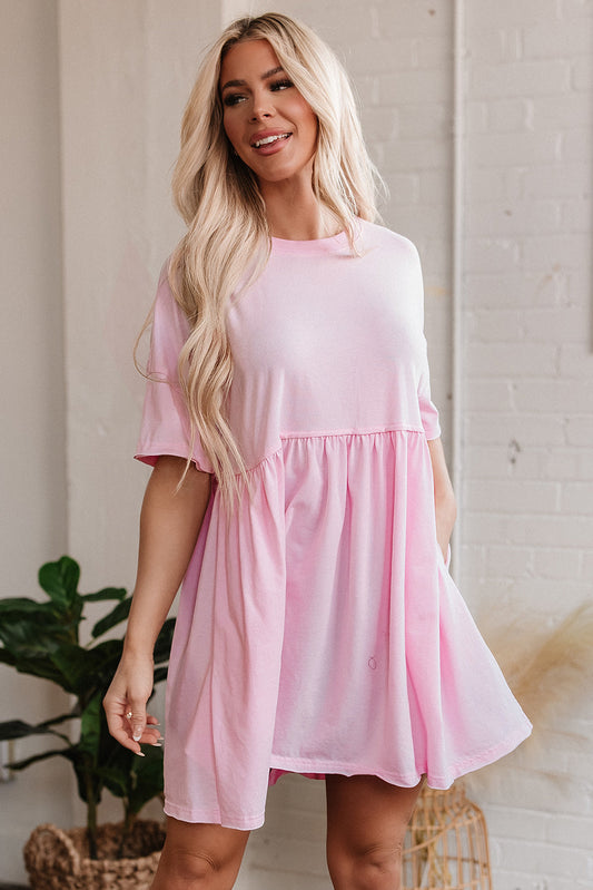 Light pink short sleeve babydoll dress, front view