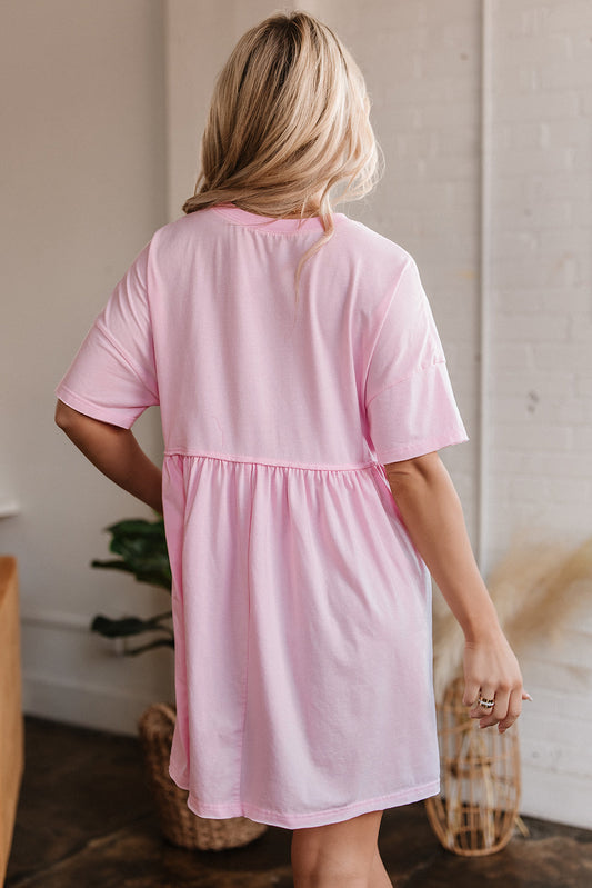 Back view of the light pink babydoll T-shirt dress