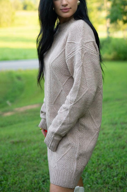 Side view of the taupe sweater dress with long sleeves
