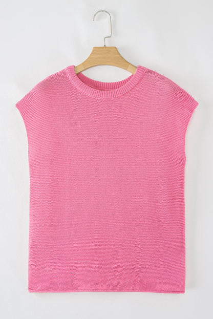Pink cap sleeve sweater tee on a hanger