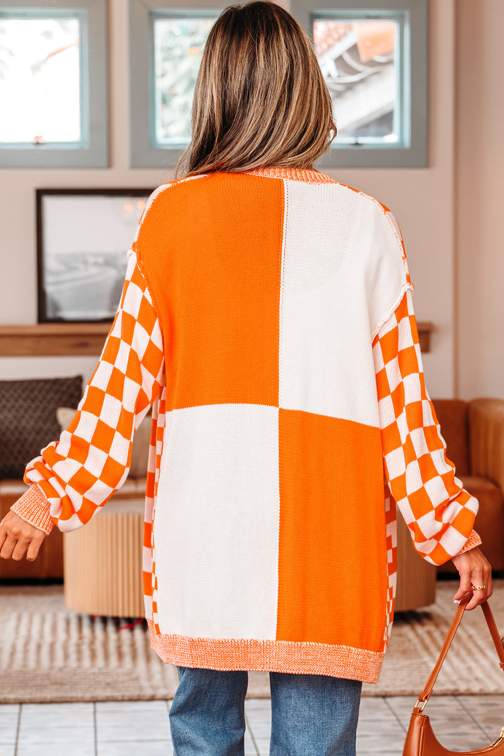 Back of the cardigan with large orange and white color-block squares