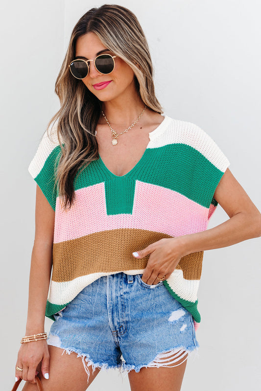 White, green, pink and brown striped knit top with denim cutoffs, front view