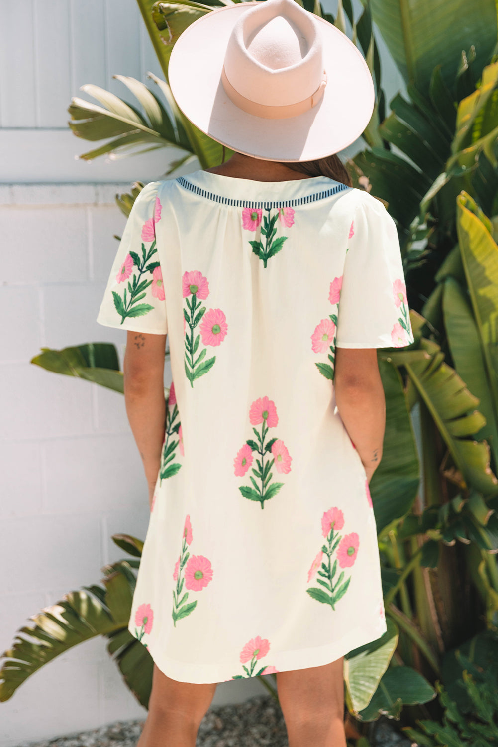 Back view of the cream floral shift dress