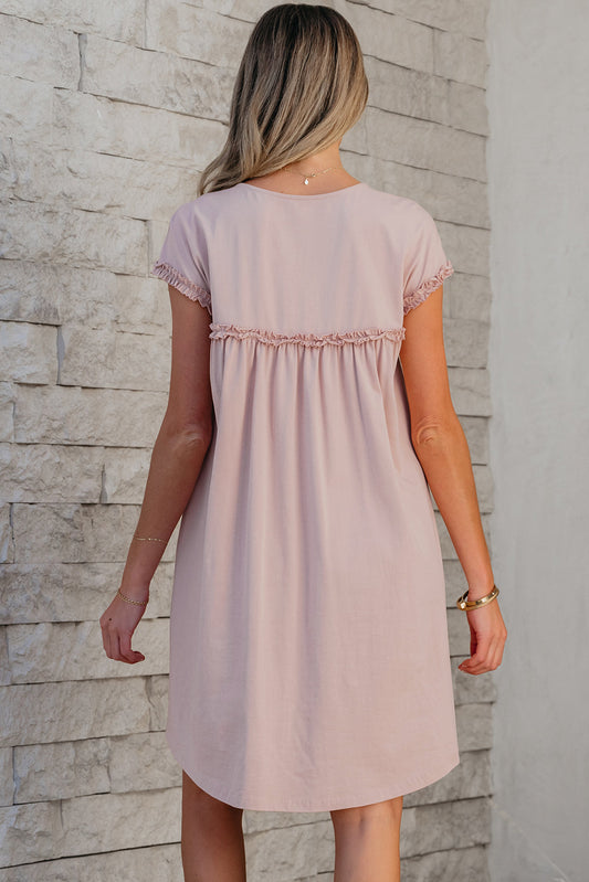 Back view of the blush babydoll mini dress