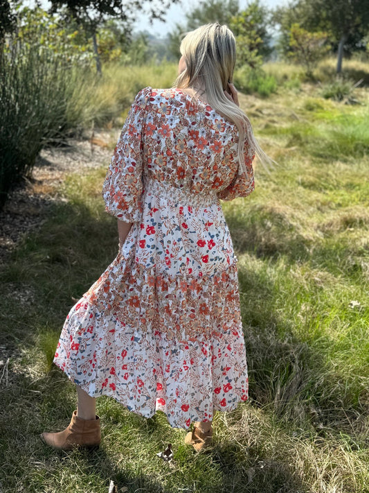 Back view of the mixed floral long sleeve midi dress
