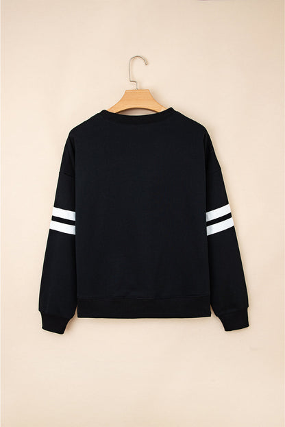 Black varsity stripe sweatshirt on a hanger, back view