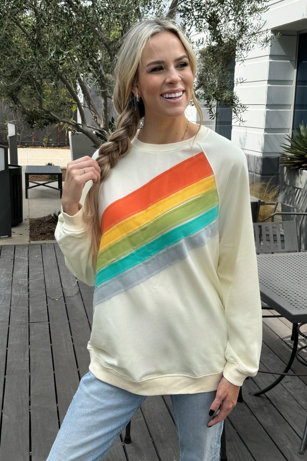 Cream rainbow stripe sweatshirt, front view