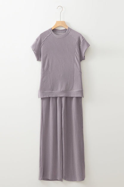 Gray ribbed knit tee and wide-leg pants set on a hanger