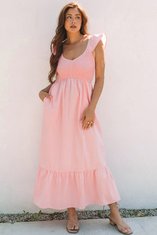 Light pink smocked bodice maxi dress with flutter sleeves, front view