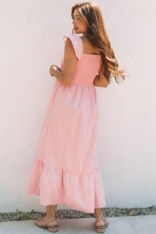 Back view of the light pink smocked maxi dress